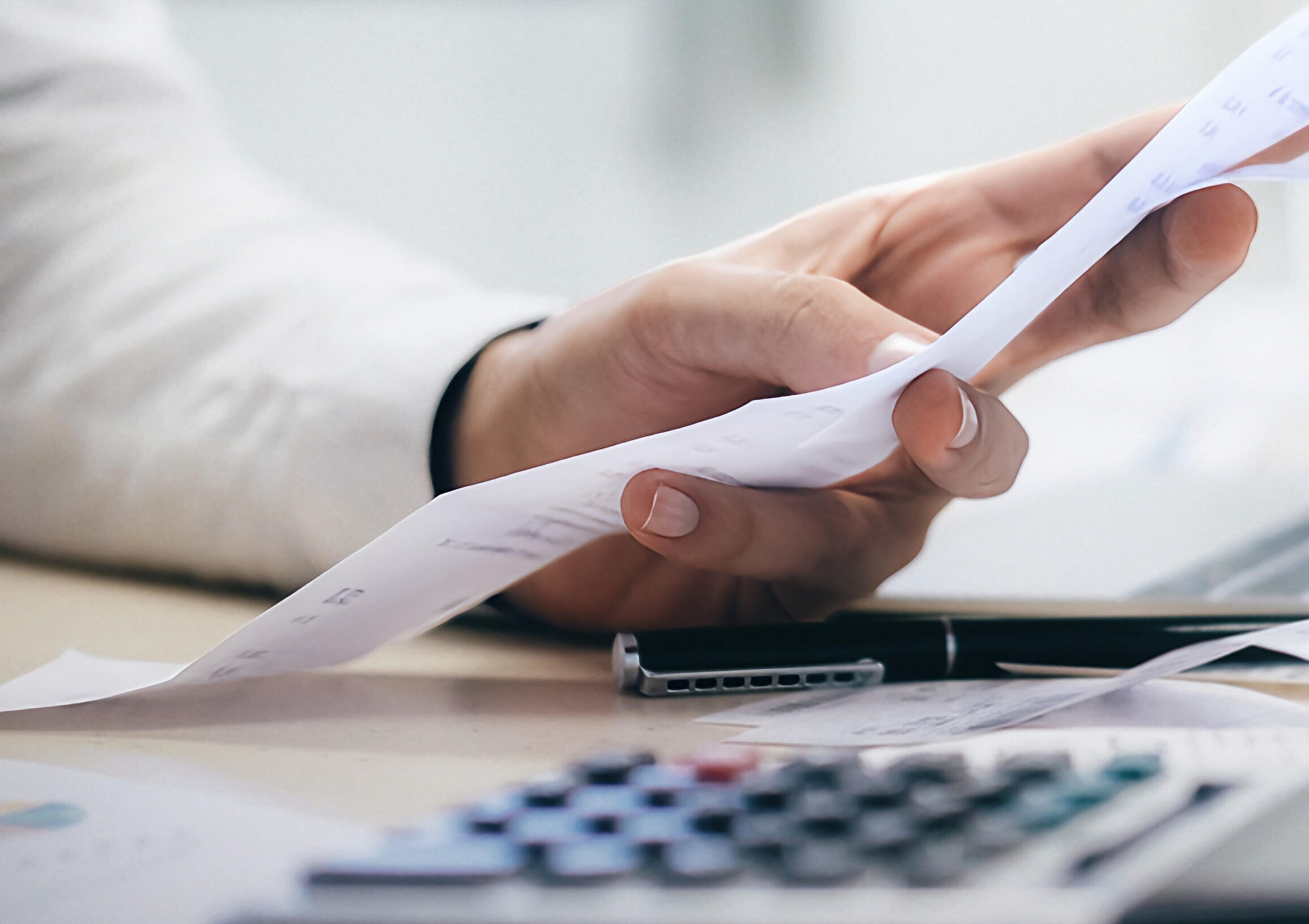 Team member holding a paper report